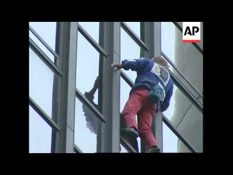 Climber scales Montparnasse tower