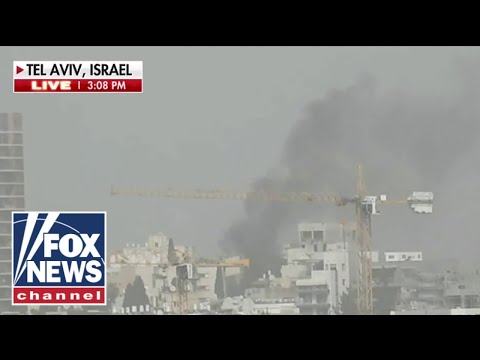 NOW: Smoke rises over Israel as Iran launches attacks