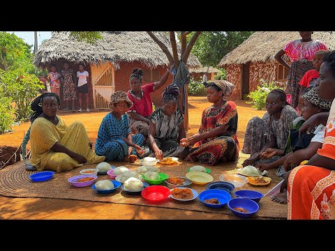 African village life/Cooking African cuisine,Roasted lemon herbs beef stew with vegetables and ugali