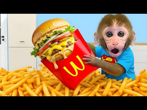 Singe Bon Bon montre ses talents pour préparer des frites et des Hamburgers de McDonald's
