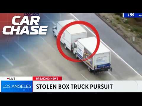 Two Box Trucks Battle in the middle of a police chase!