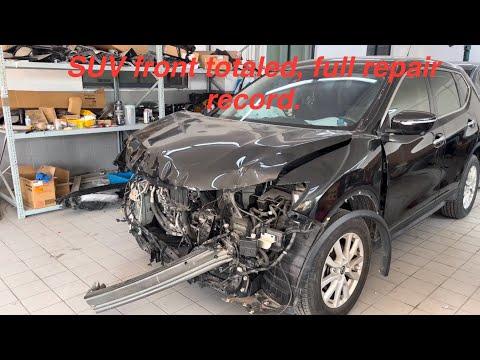 SUV front totaled, full repair record.
