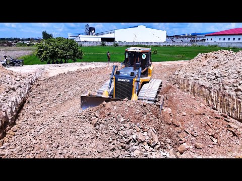 Incredible bulldozer pushing soil building foundation road with stones