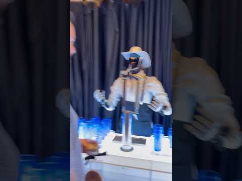 Tesla Optimus Bot pouring me a draft cocktail at We Robot #teslabot
