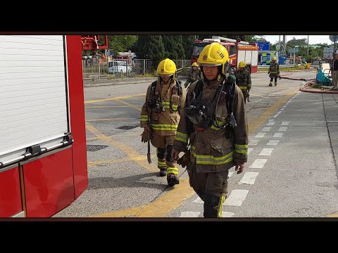 Unsung Heroes Entering and Exiting the Fire at Hung Fook Court, Tai Po