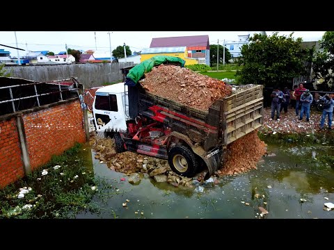 Big Rock Unload By 5t Truck And Push By Bulldozer 20p To Remove The Flood