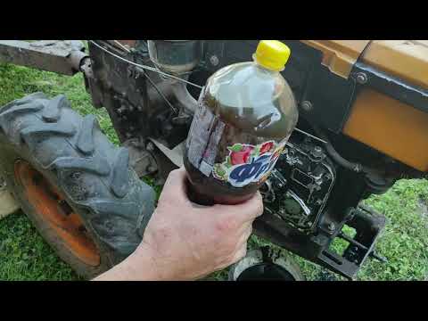 Changed the oil in the Centaur walk-behind tractor. I polished up the walk-behind tractor engine.