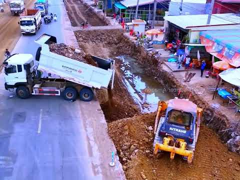 High-Strength Road Base Process as Komatsu Bulldozer Pushes Fresh Soil into Perfect Layers