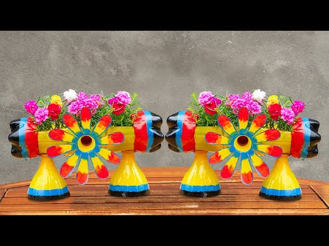 Recycle old coke bottles to make beautiful ten o'clock flower pots to decorate your desk