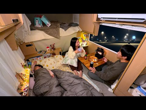 Christmas car camping night spent together as a family in a small camper