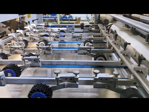 Manufacturing process of corrugated box. A paper box production factory.