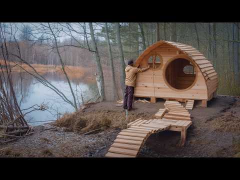 A Man Built a House by the River. Building in the Forest and Fishing