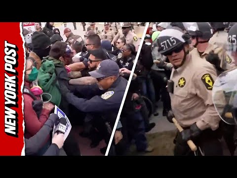 'They're Hitting us With F–king Sticks': Police Scuffle with Protestors Outside ICE Facility