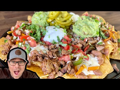 These STEAK FAJITA NACHOS were the BEST NACHOS WE'VE EVER HAD EVER!  Epic Griddle Nachos!