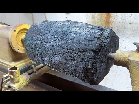 They took a rotten piece of wood, burned it, and transformed it into a simple masterpiece