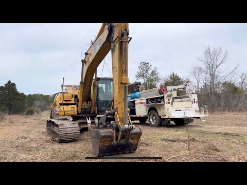 Cat 320C engine oil cooler field service repair.