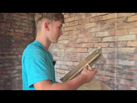 TRYING TO SHOW HIM HOW TO DAB A WALL