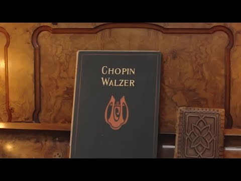 Richard E. Grant's "Wonky" Piano Spreads Festive Cheer