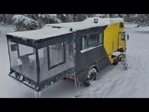 CAMPING WITH A CAMPER TRUCK WITH STOVE IN HEAVY SNOW