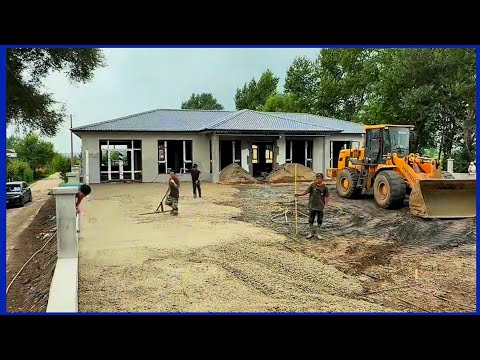 The workers built a beautiful new house and a large garden in the countryside.