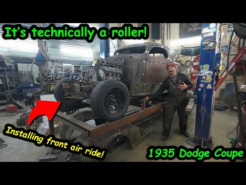 Installing front air suspension, shock mounts along with trans mount.