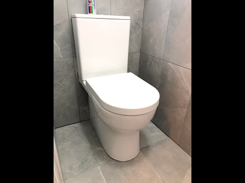 Rimless toilet installation, back to wall