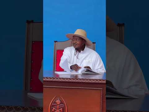 Museveni signs in the visitors book as President Samia Suluhu looks on. Viva East Africa #uganda #m7