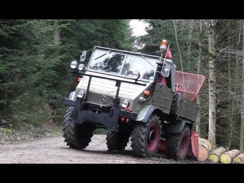 UNIMOG 411 mit FARMI-Winde beim Holz rücken