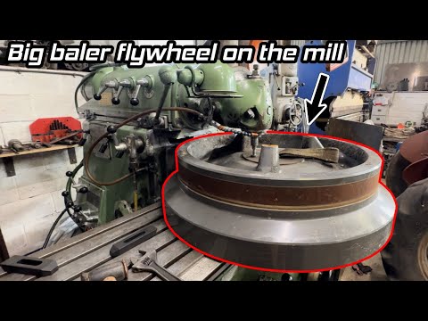 Repairing damaged shear bolt hole on big baler flywheel.