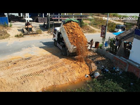New Project Bulldozer Pushing Dirt And Dump Truck Working Unloading Dirt Building Car Parking