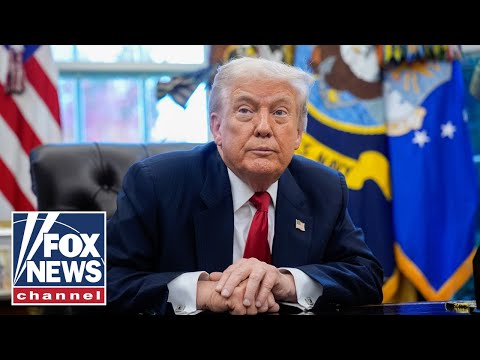 President Trump signs executive orders and congressional bills in the Oval Office