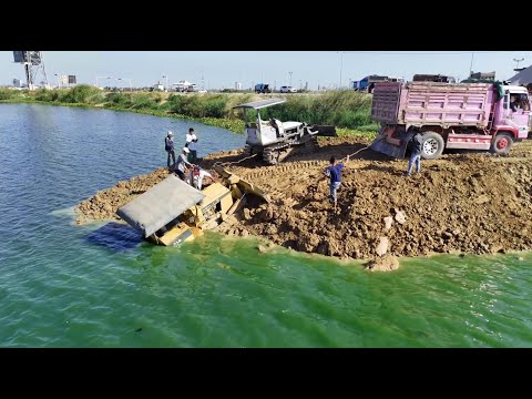 Incredble!Dozer D31A Landslided Stuck In WaterRecovery Helping By Dump Truck ,Small Dozer And People