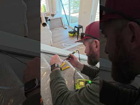 We turned our staircase into a feature wall with hidden door, LED path lighting and custom railing!