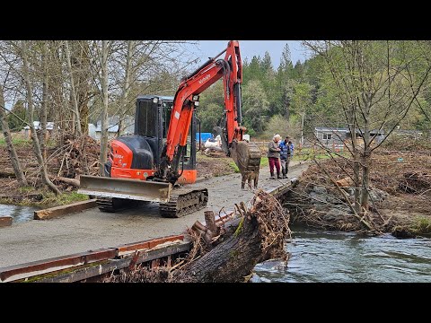 Log jammed bridge with the Kubota KX 040 4 excavator