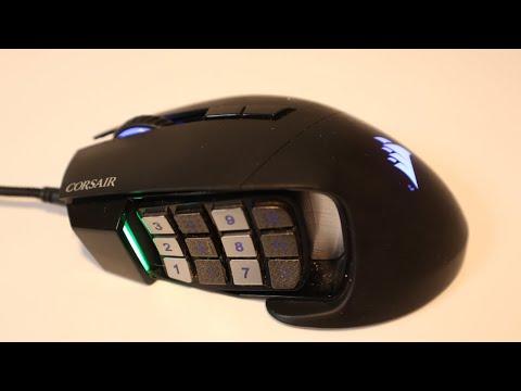 Take Control with the Scimitar RGB Elite: 12-Button Gaming Mouse for MOBAs & MMOs
