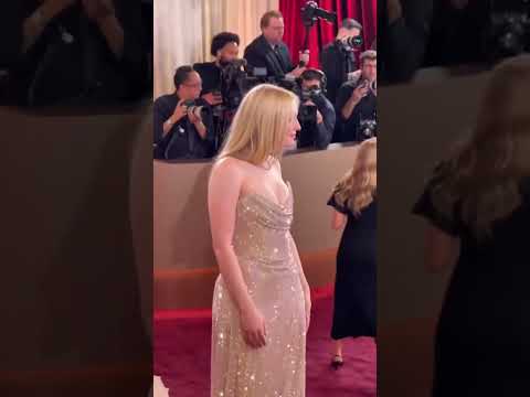 Dakota Fanning arriving at the 83rd Annual Golden Globes