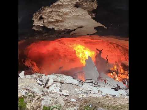 I MADE a CAVE by CARVING the ROCK with FIRE using PRIMITIVE METHODS  #diy #winter #camping