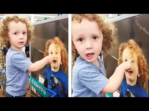 Little Boy Spots His Doppelganger on a Poster at Walmart