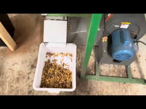 Pecan cracking and shelling at Pecan Lane, your partner for quality pecans.