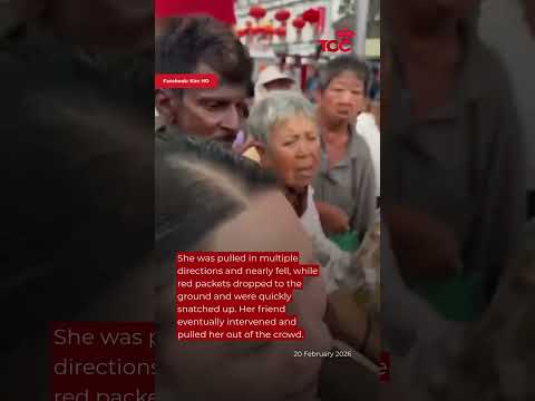 Woman in Malaysia nearly trampled after handing out red packets at Penang temple