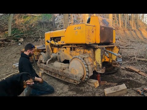 Fixing a John Deere 450 track and building a crane
