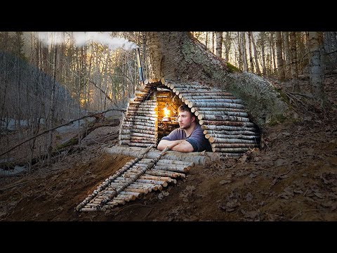 Building a hidden dugout survival shelter, under a tree trunk, bushcraft