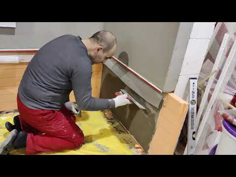 Foundation insulation technology with Penoplex, a double base reinforcing layer for stone and tiles