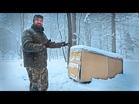Surviving a Snow Storm in a Cardboard Shelter on a Sled