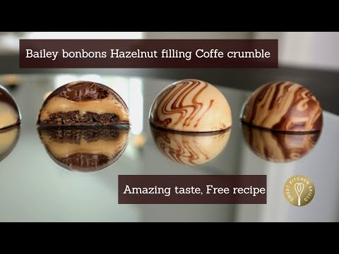 Bailey bonbons with a marbled chocolate shell, hazelnut filling and a crunchy surprise