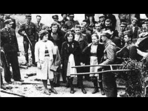 Execution of Stutthof camp female guards crowd cheer as nazis hanged by short-drop 