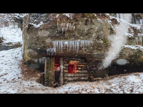 Hidden BUNKER of STONE and LOGS under the Rock