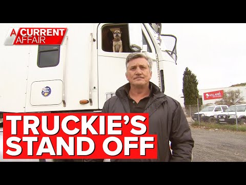 Truckie and his dog sleep at petrol station for weeks after dispute | A Current Affair
