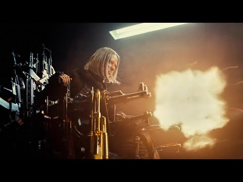 She kills her father, seizes the gun-throne, and becomes the new queen of the wasteland.