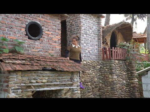 Woman build a House with a dome made entirely of cobblestones